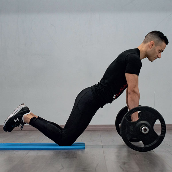 Posizione inziale dell’esercizio denominato AB Wheel